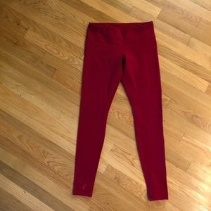Red Lululemon yoga pants